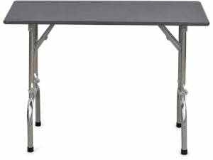 Folding grooming table with grey plastic top and adjustable metal legs